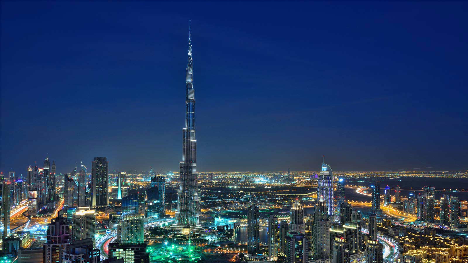 An aerial view of Dubai at night.