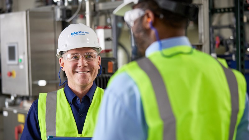 smiling man in hardhat